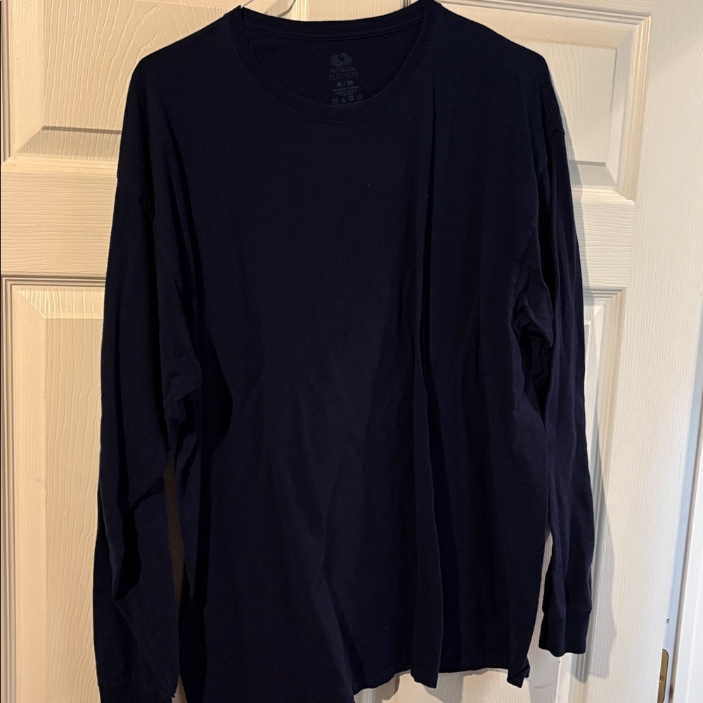 Two men’s long sleeve tee shirts. Both XL